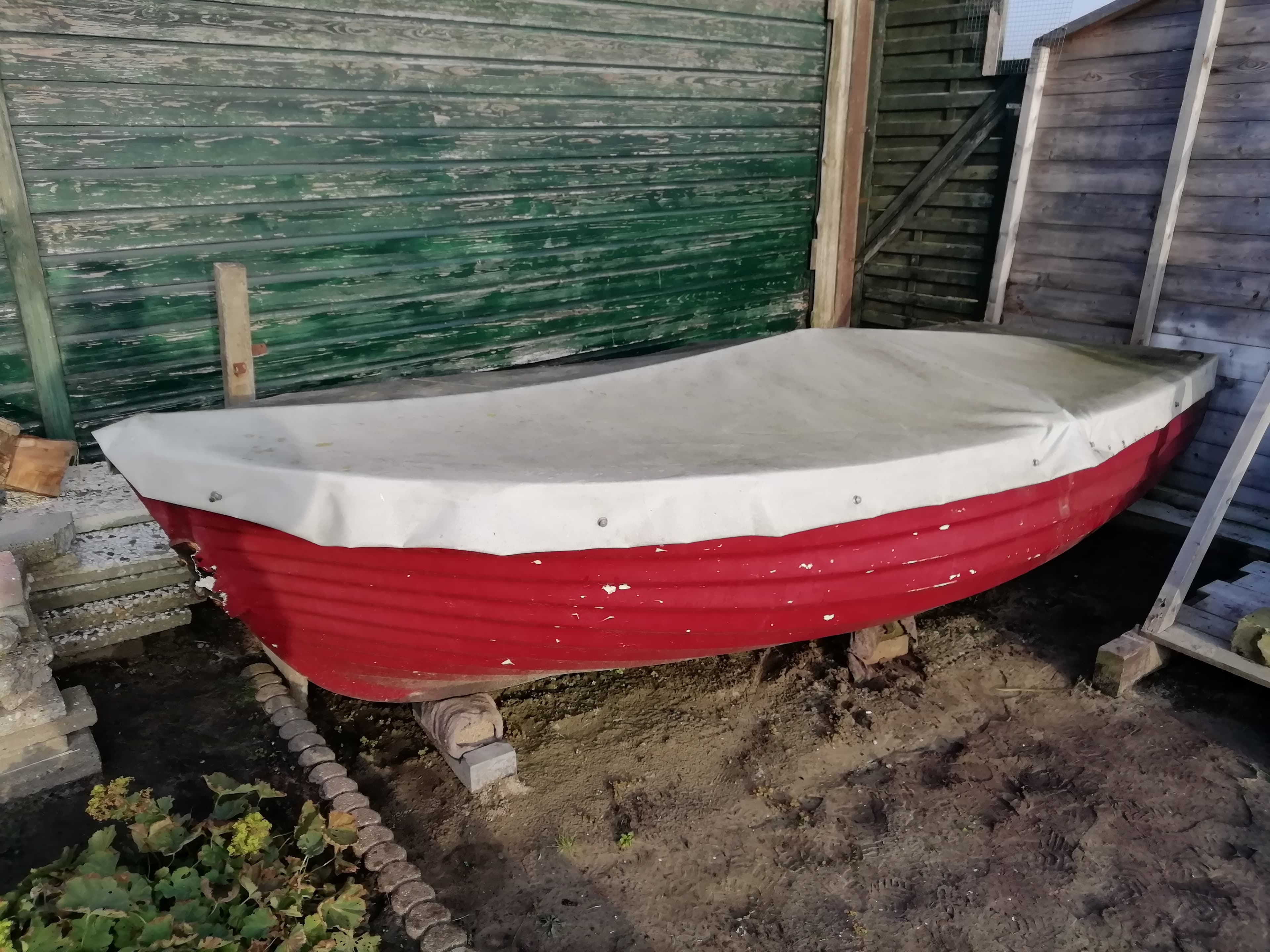 Sloep/visboot met afdekzeil
